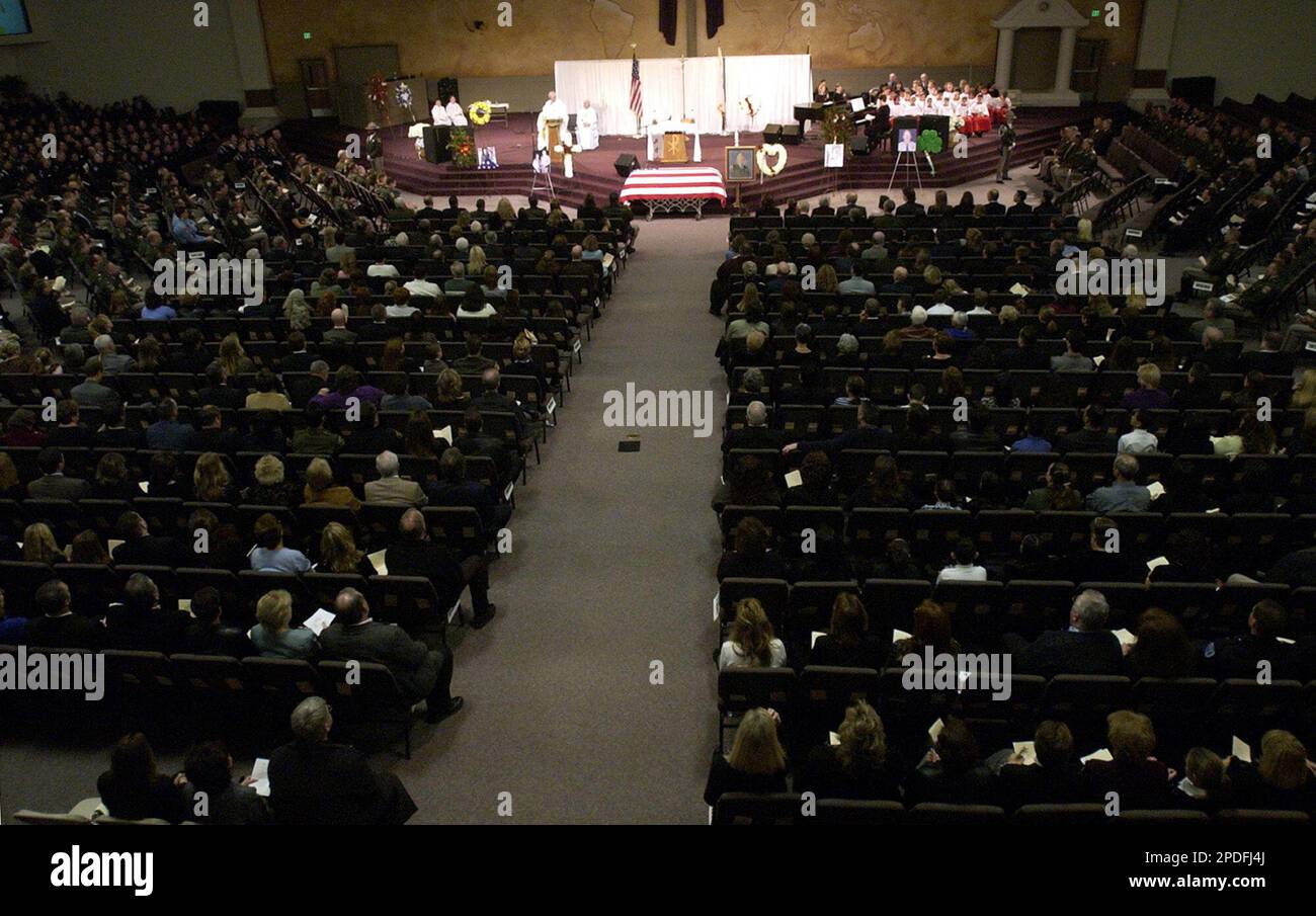 a crowd fills the sanctuary of The Mission Church in Vacaville