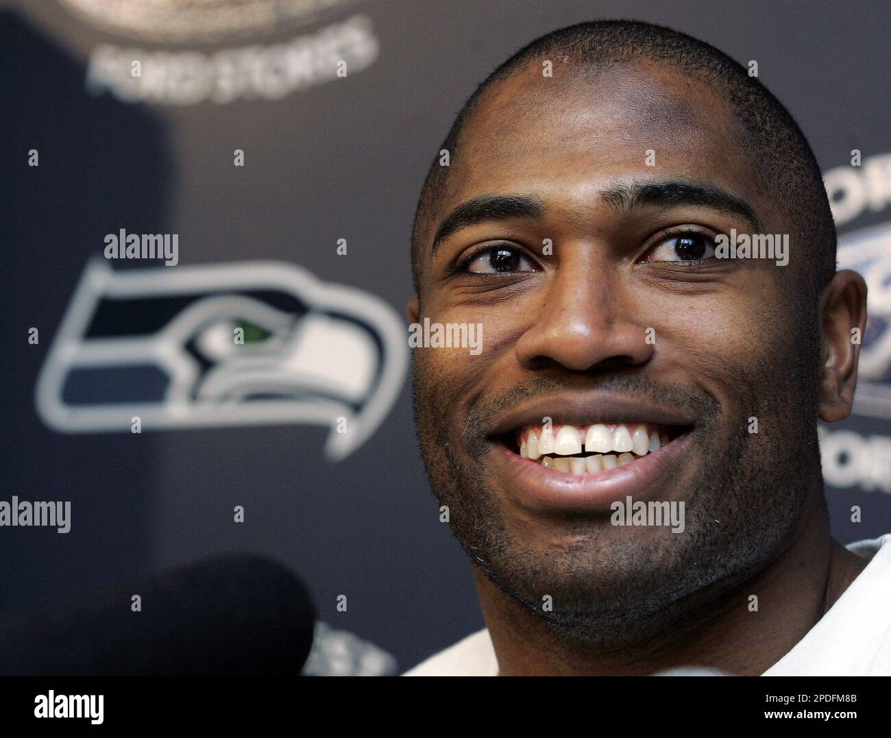 Seattle Seahawks football running back Shaun Alexander smiles as he