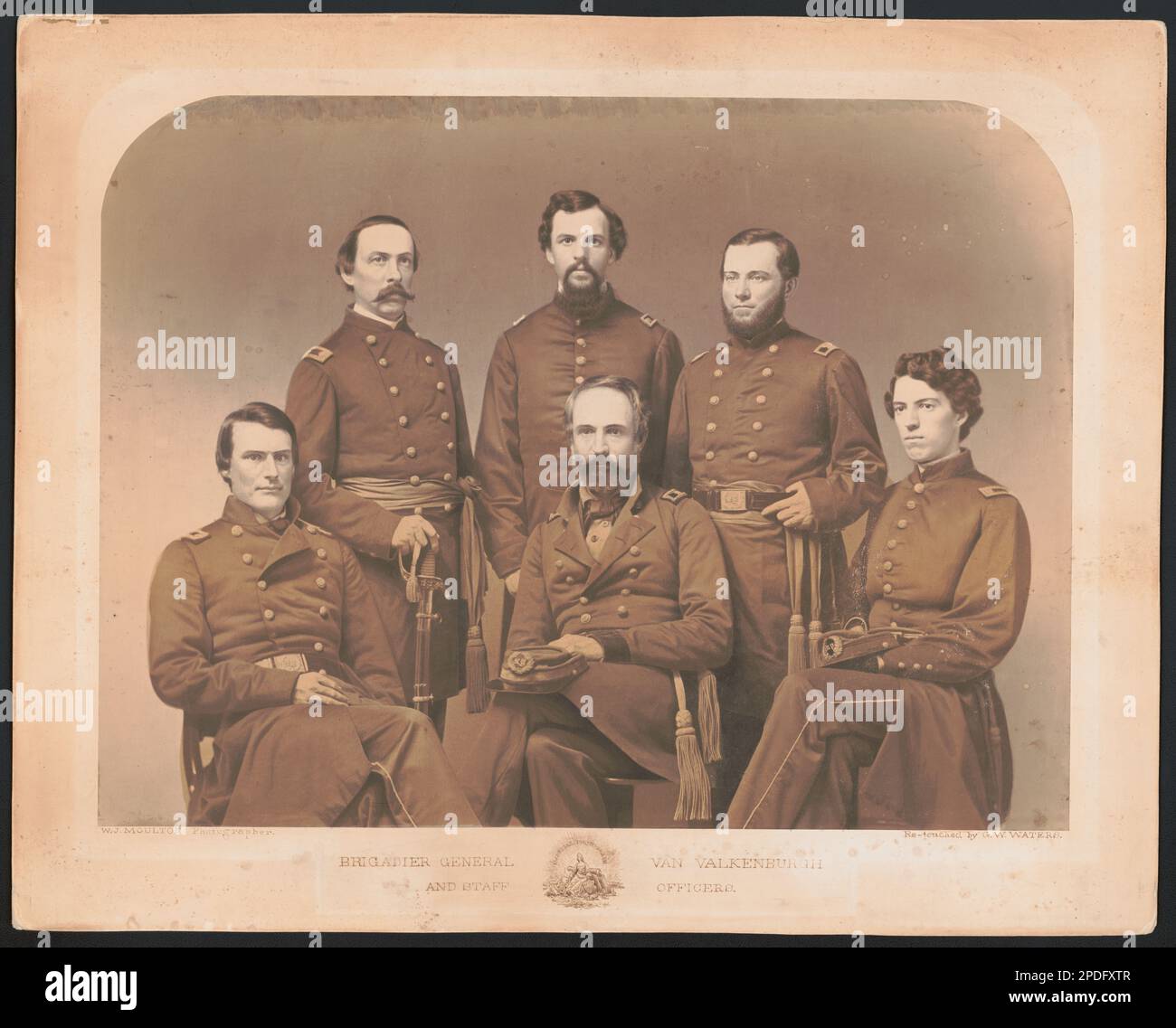 Brigadier General Van Valkenburgh and staff officers / W.J. Moulton, photographer ; re-touched by G.W. Waters.. Liljenquist Family Collection of Civil War Photographs , pp/liljpaper. Van Valkenburgh, R. B, (Robert Bruce), 1821-1888, Smith, Gabriel L, 1824-1906, Graves, Edward P, 1840-1901, United States, Army, New York Infantry Regiment, 107th (1862-1865), People, Soldiers, Union, 1860-1870, Military uniforms, Union, 1860-1870, United States, History, Civil War, 1861-1865, Military personnel, Union. Stock Photo