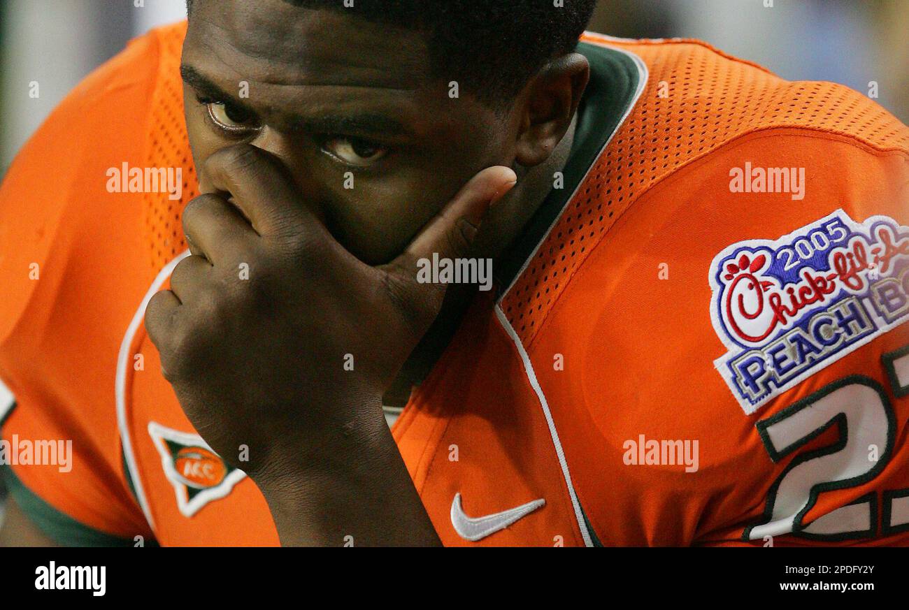 Miami running back Quadtrine Hill (23) reacts at the end of a 403 loss