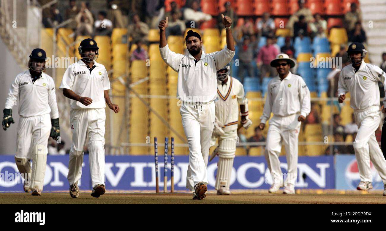 India's Harbhajan Singh, center celebrates the dismissal of Sri Lanka's