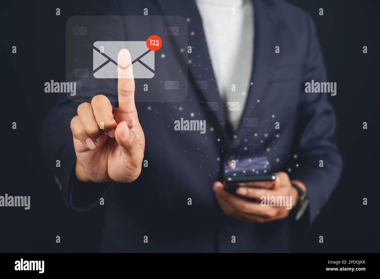 Businessman touching email on virtual screen. electronic message. Email notification concept. Stock Photo