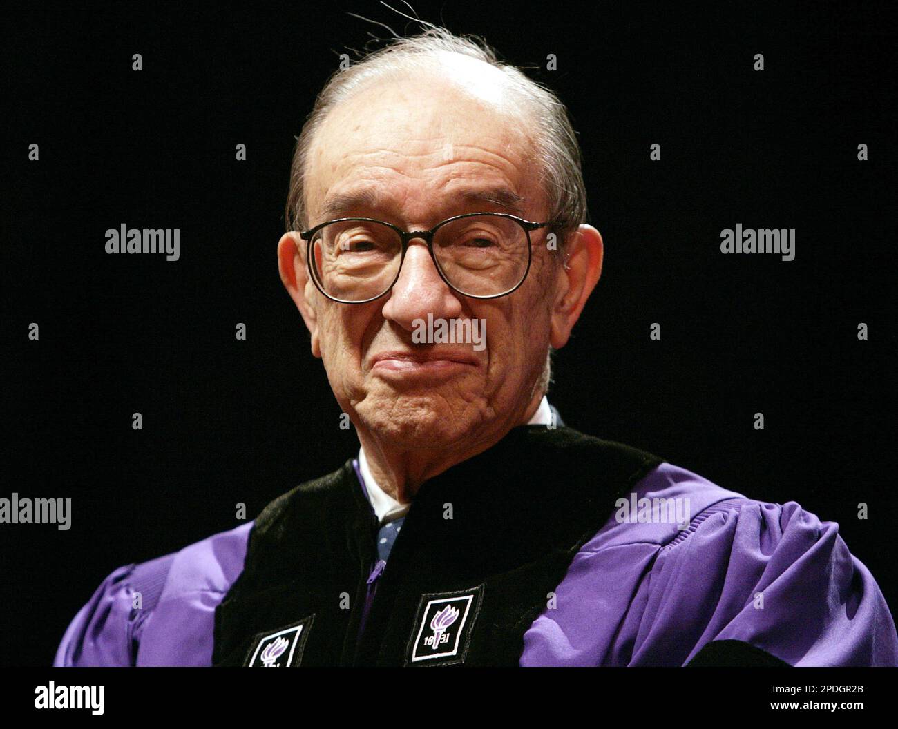 Federal Reserve Board Chairman Alan Greenspan Reacts While Being federal-reserve-board-chairman-alan-greenspan-reacts-while-being