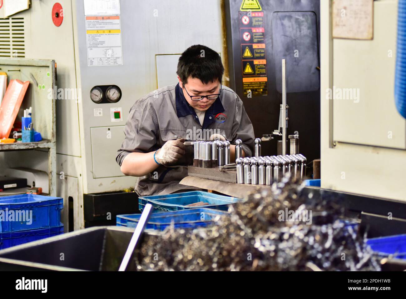 QINGZHOU, CHINA - MARCH 15, 2023 - A worker works at a workshop of an ...