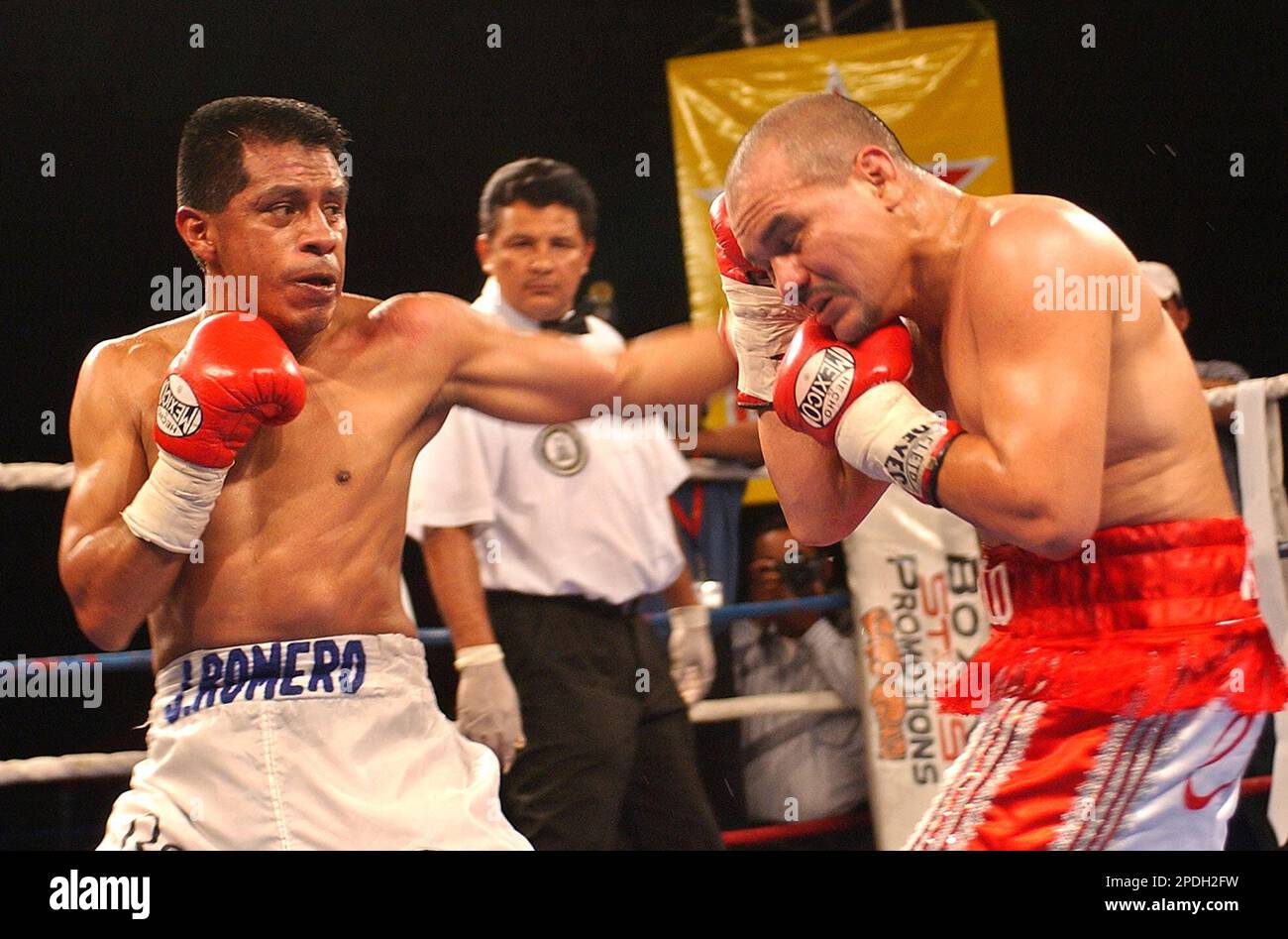 Mexican boxer Jorge Romero left lands a blow to Nicaraguan Rosendo El Bfalo Alvarez during a fight in Tipitapa 13.6 miles 22 km east of Managua Nicaragua Saturday Dec 10 2005. Rosendo