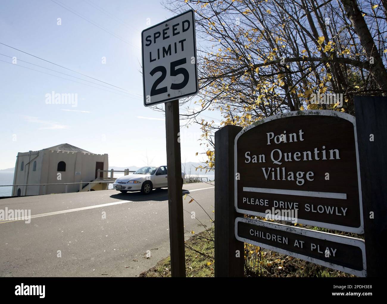 A car drives out of the main road that leads through Point San Quentin