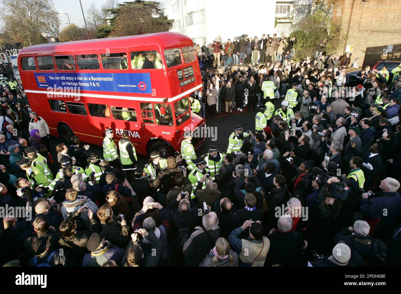 The last routemaster double-decker bus is surrounded by fans as it ...
