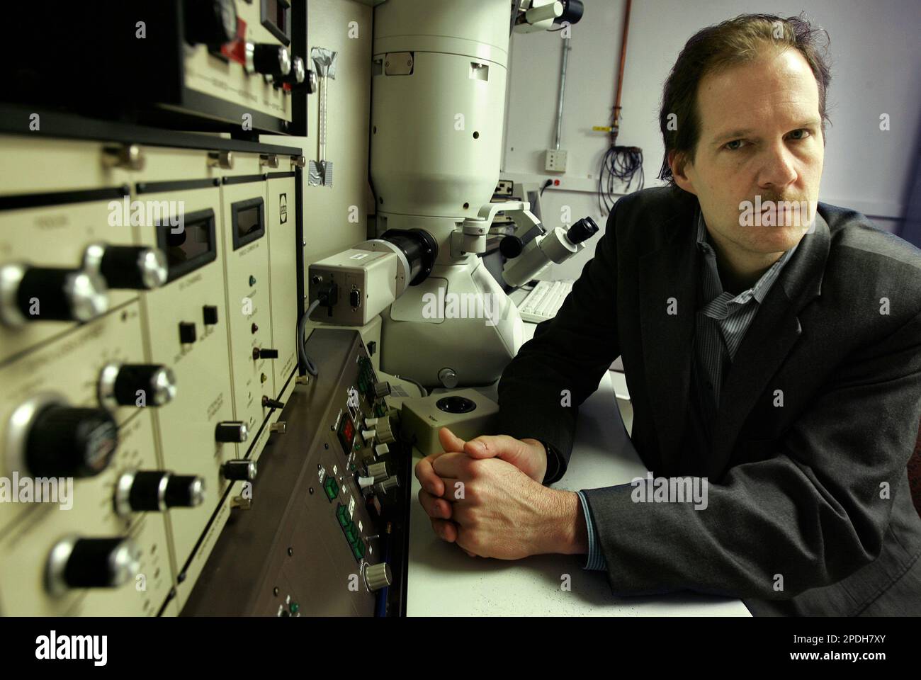 Engineering Professor Robert Hurt, of Barrington, R.I., sits next to an