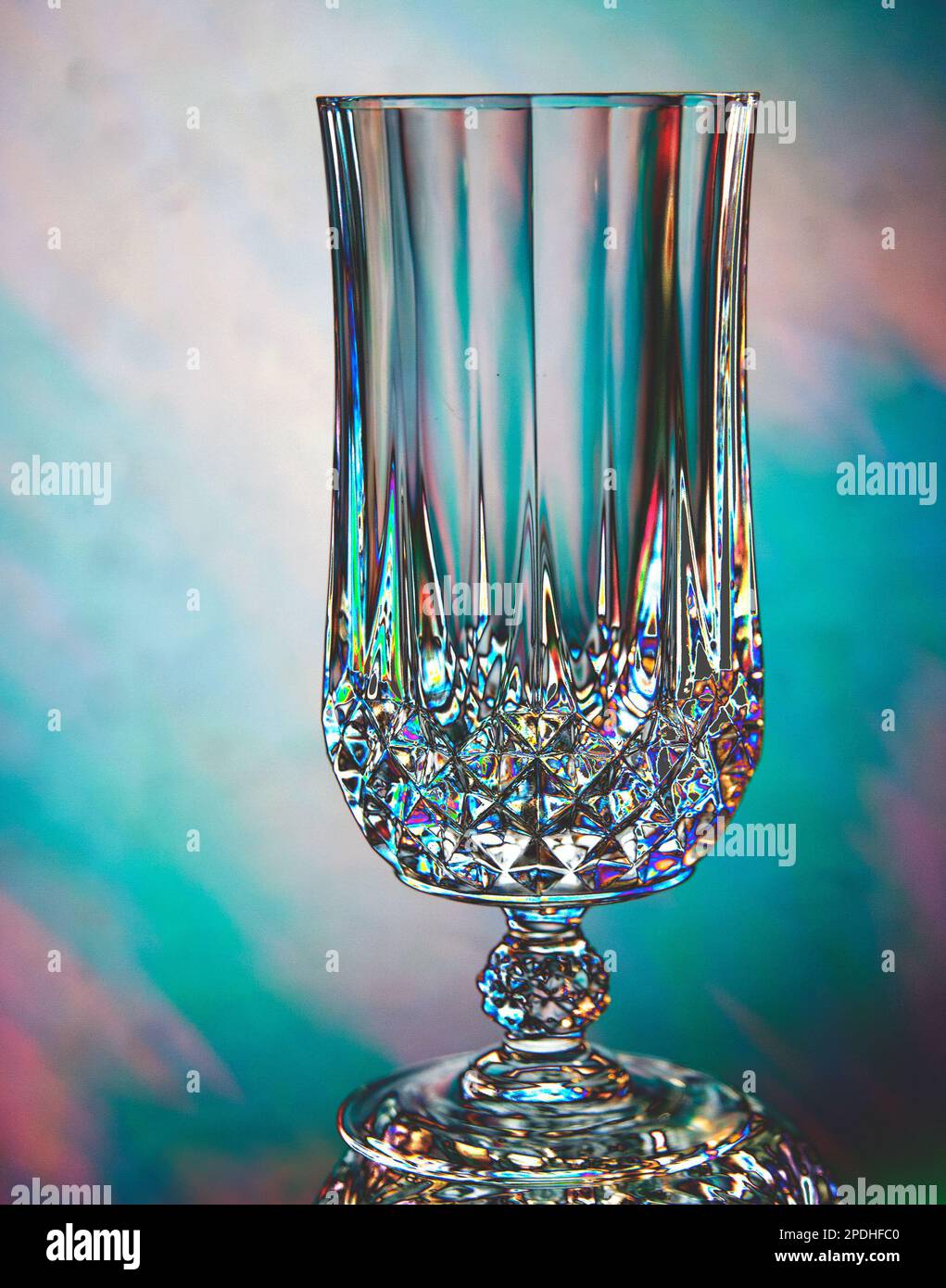 Crystal glass on pastel background Stock Photo