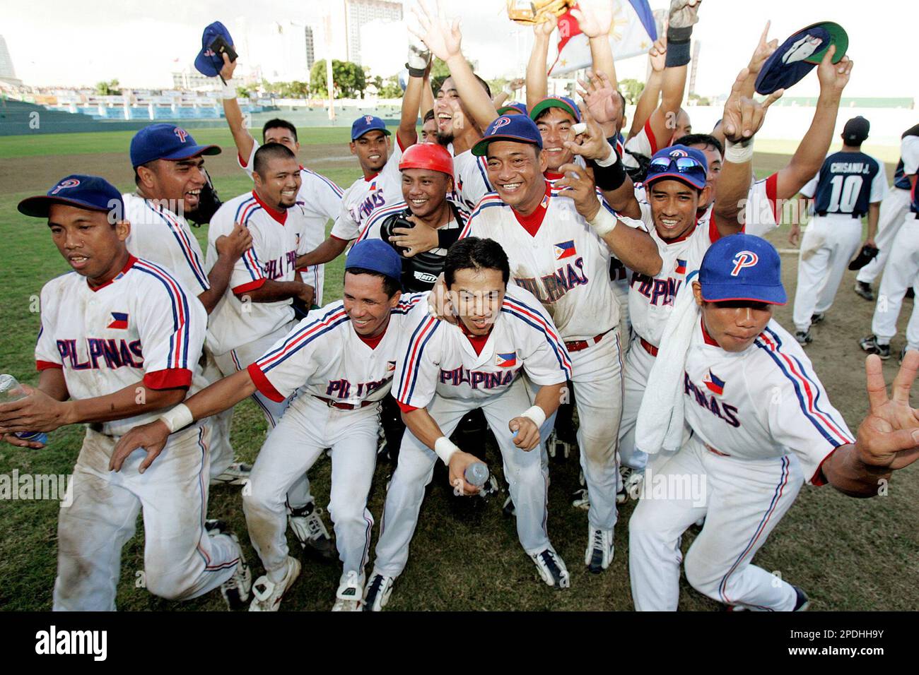 Philippine baseball team celebrates their win over Thailand at Rizal