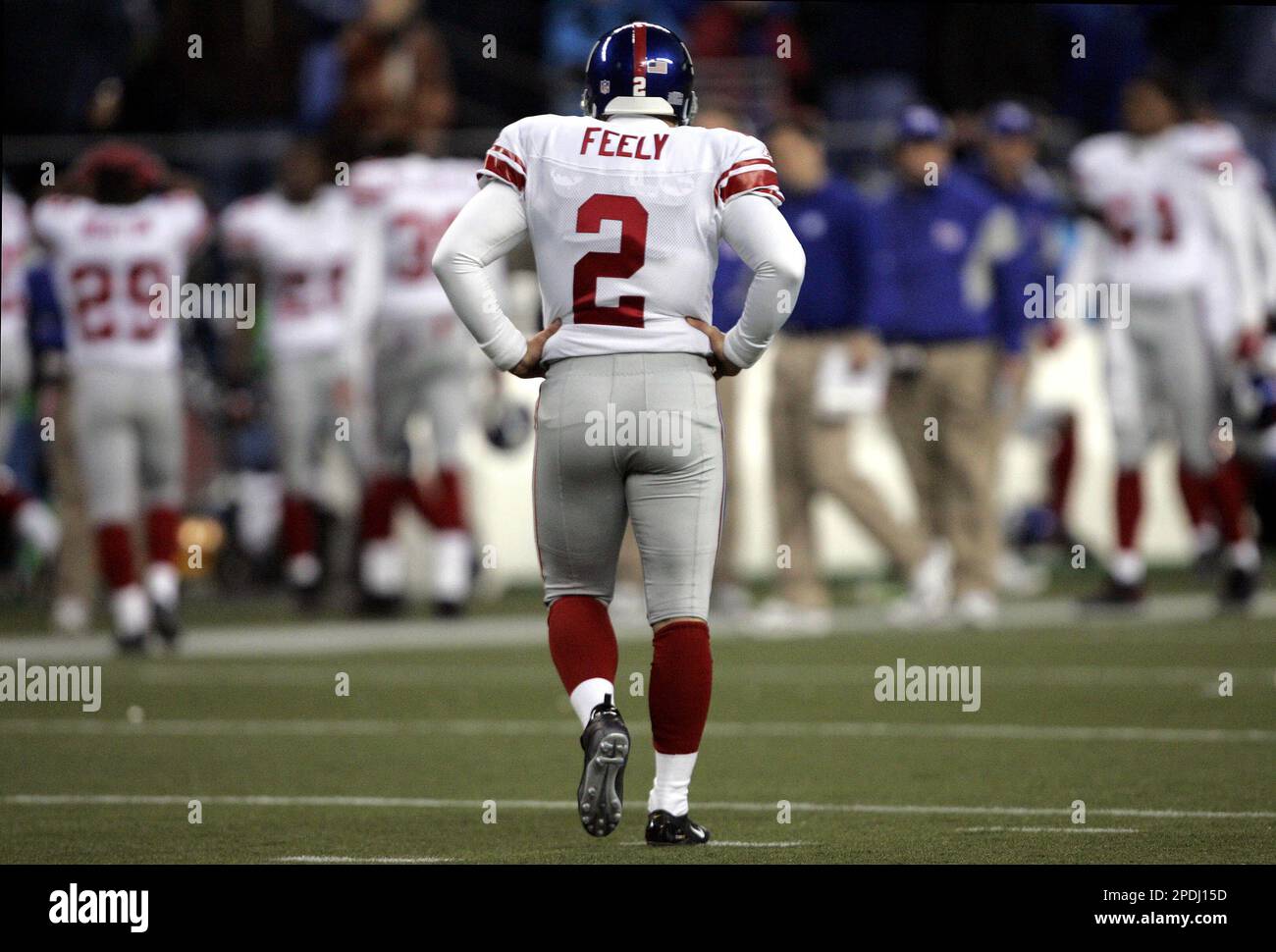 New York Giants kicker Jay Feely heads toward the sideline after