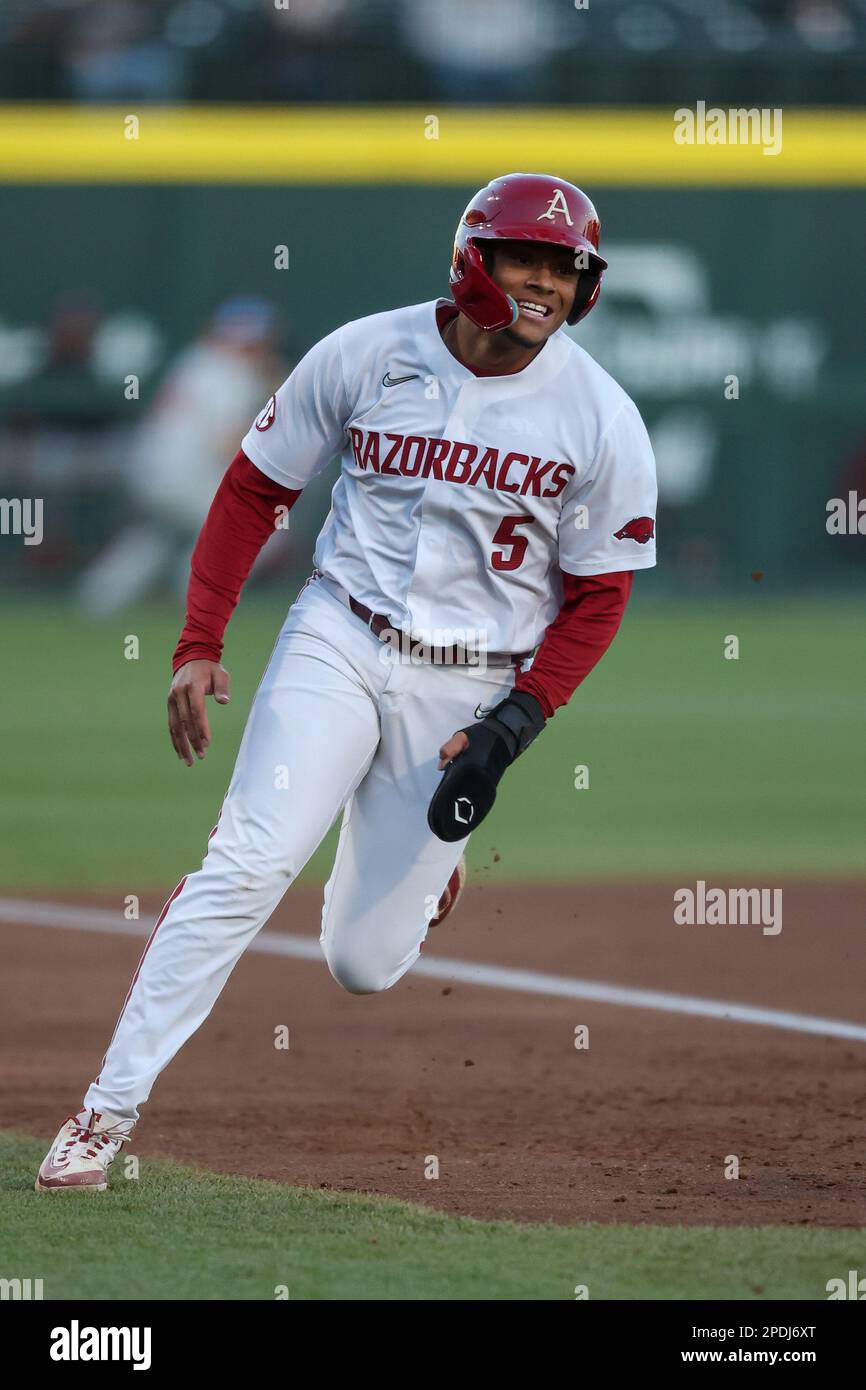 March 14, 2023: Kendall Diggs #5 of Arkansas rounds third base headed towards home. Arkansas defeated UNLV 13-7 in Fayetteville, AR, Richey Miller/CSM Stock Photo