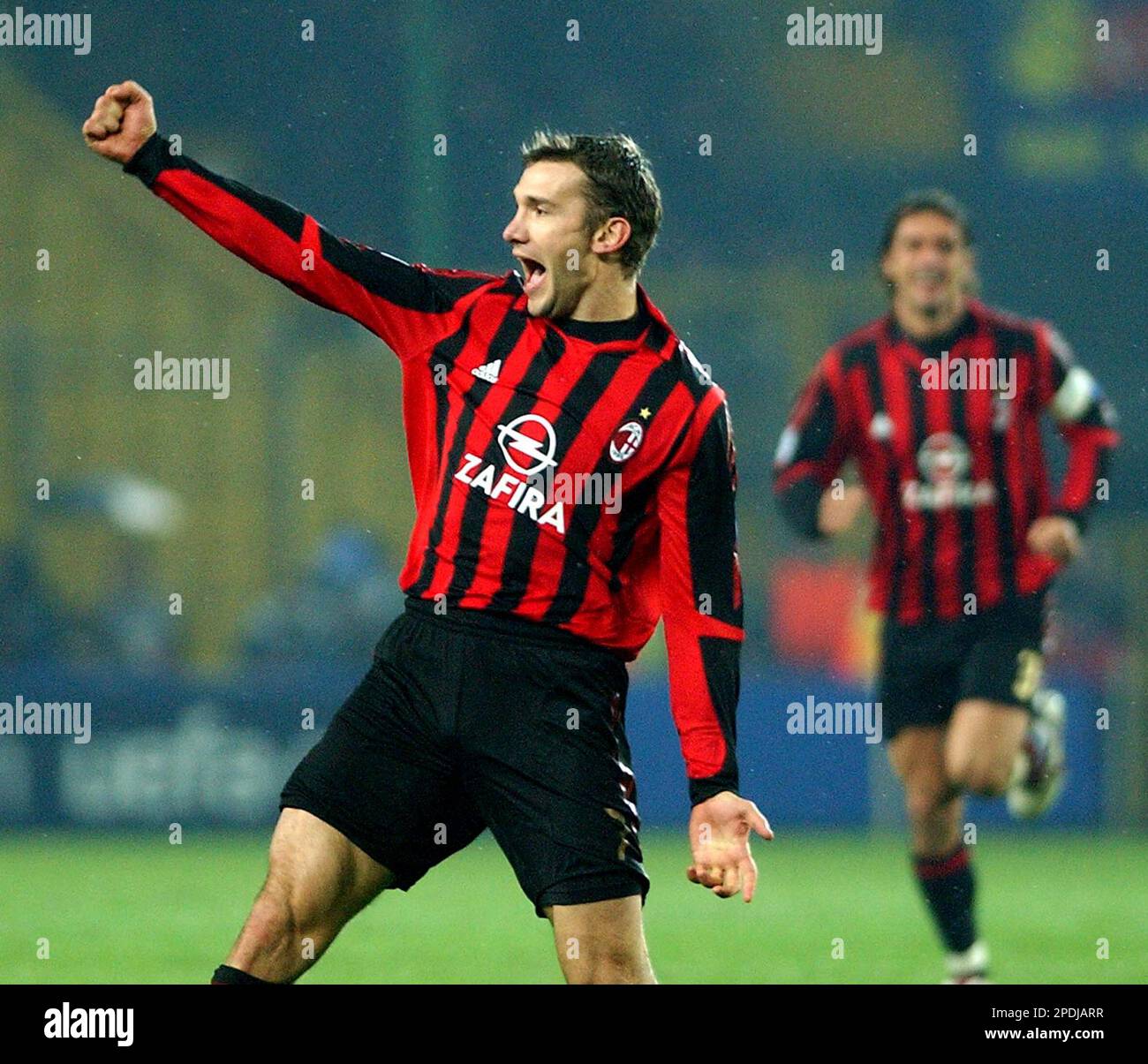 AC Milan's Andriy Shevchenko celebrates with goalkeeper Dida after winning  the UEFA Champions League final Stock Photo - Alamy