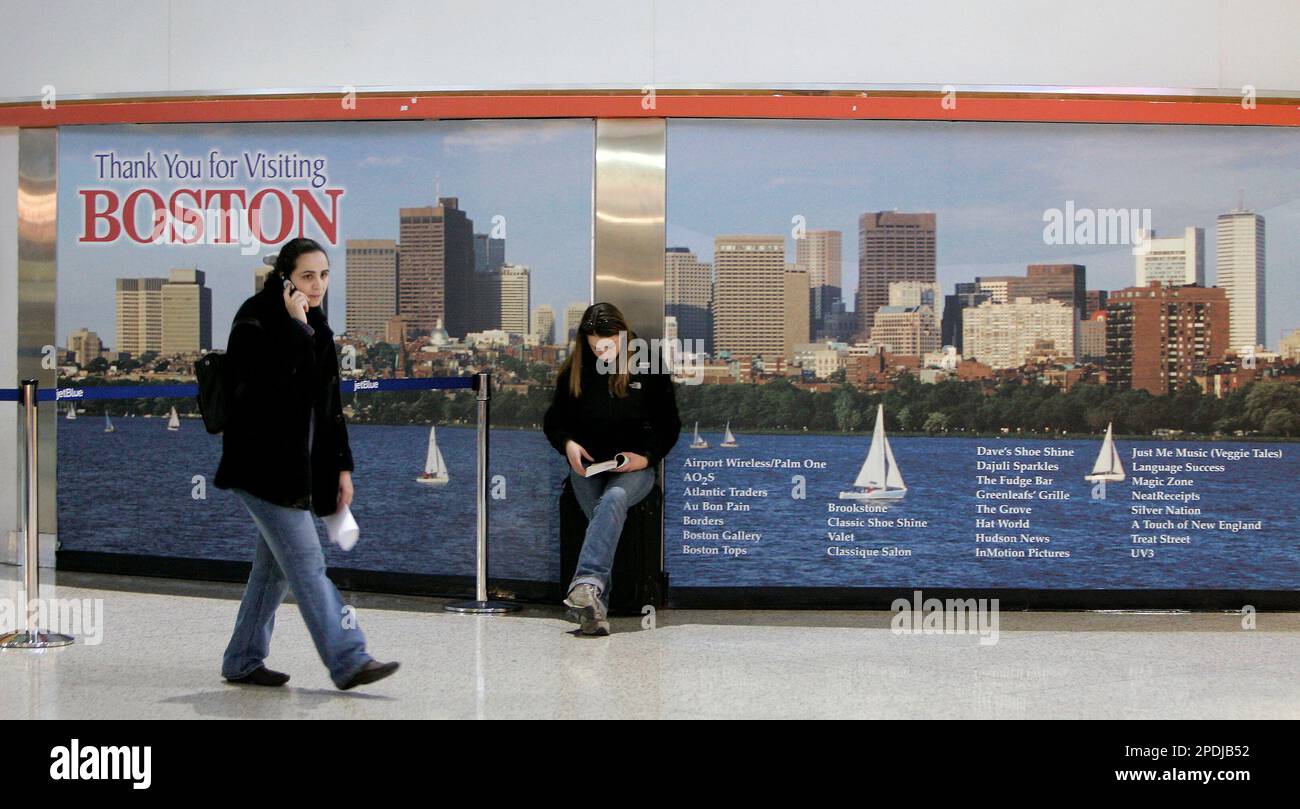 Amanda Abbinanti center of Rockville Center N.Y. reads a book