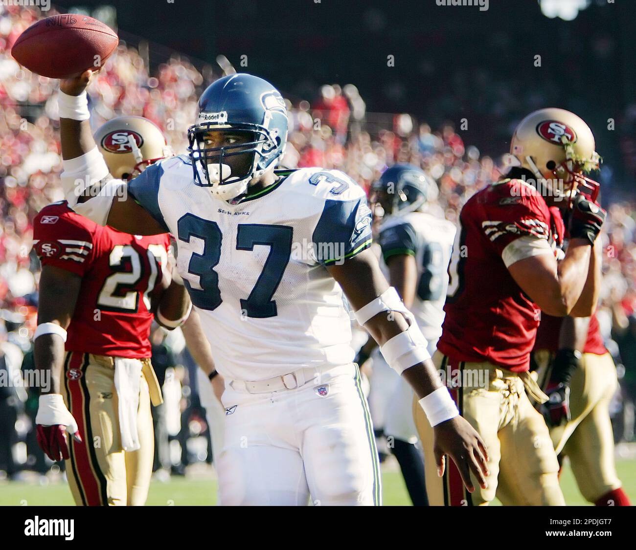 Seattle Seahawks running back Shaun Alexander (37) celebrates after a