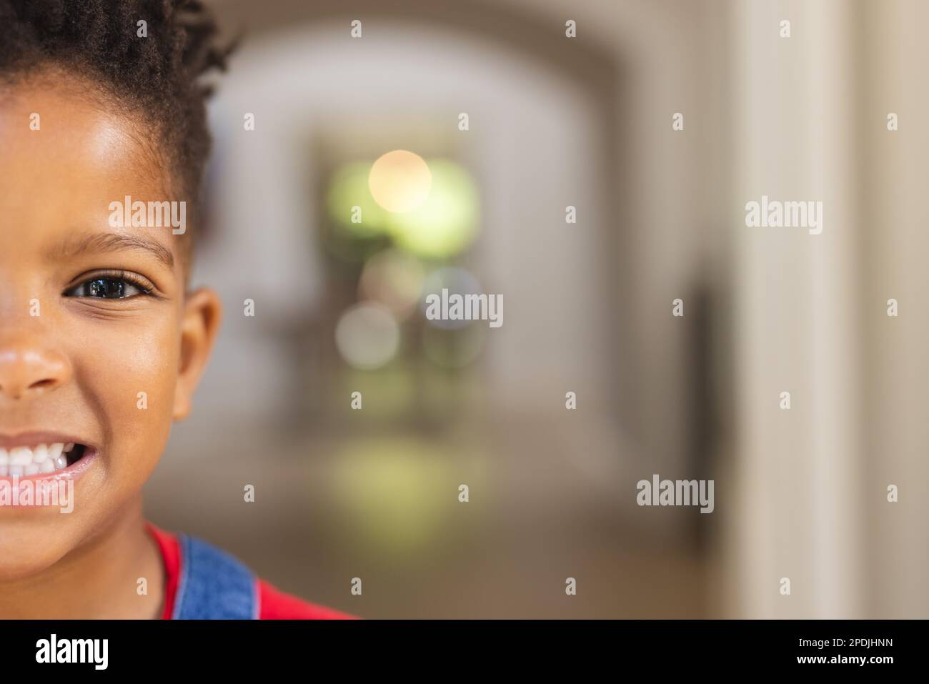 Portrait of happy african american boy looking at camera and smiling ...