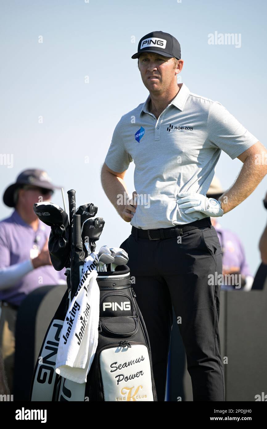 Seamus Power, right, of Ireland, waits to hit his tee shot on the 16th