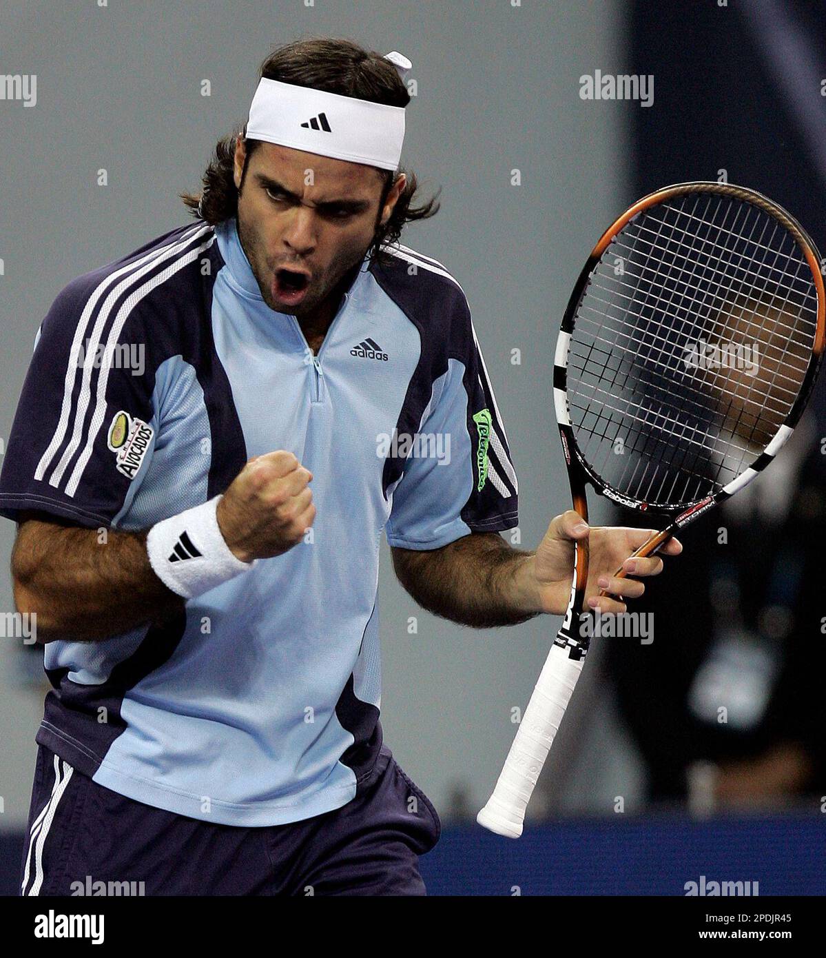 Chile's Fernando Gonzalez celebrates after gaining a point against  Argentina's Gaston Gaudio during the Shanghai Tennis Masters Cup held at  the Qi Zhong stadium in Shanghai, China, Friday, Nov 18, 2005. (AP