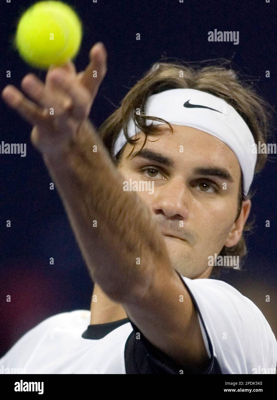 World's number one player, Switzerland's Roger Federer prepares to serve a  ball against Argentina's David Nalbandian (unseen) during the opening match  for the Shanghai Tennis Masters Cup held at the Qi Zhong