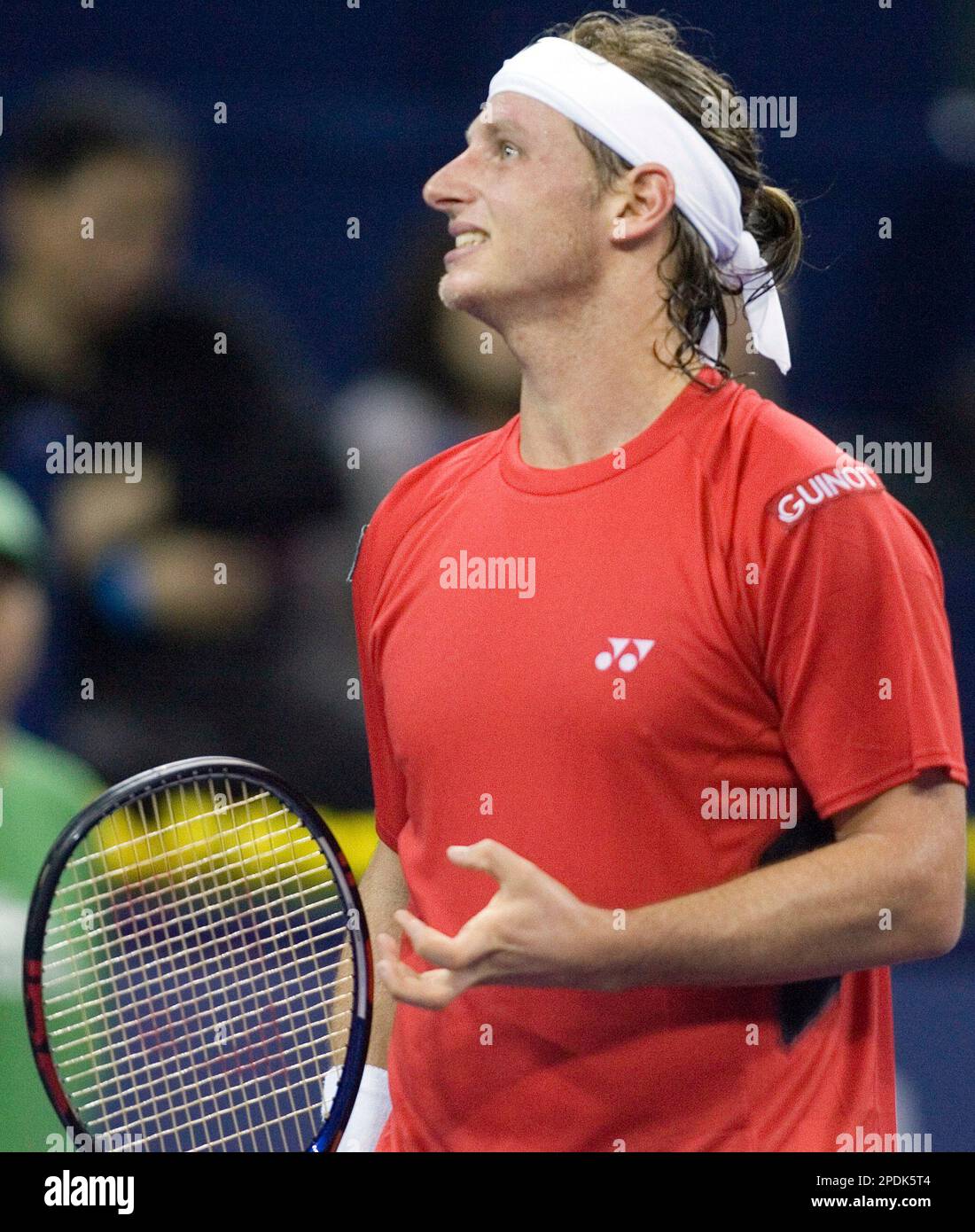 Agentina's David Nalbandian reacts after losing a point to world's number  one player, Switzerland's Roger Federer during the opening match for the Shanghai  Tennis Masters Cup held at the Qi Zhong stadium
