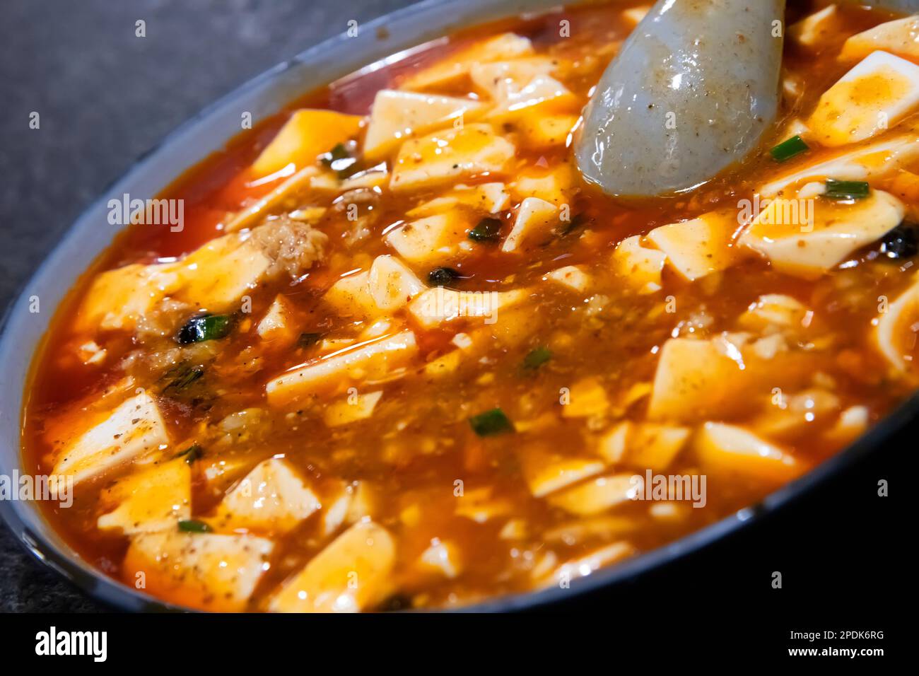 Chinese restaurant, Spicy Mapo tofu, a popular Chinese dish from Sichuan province. Hong Kong , China. Stock Photo