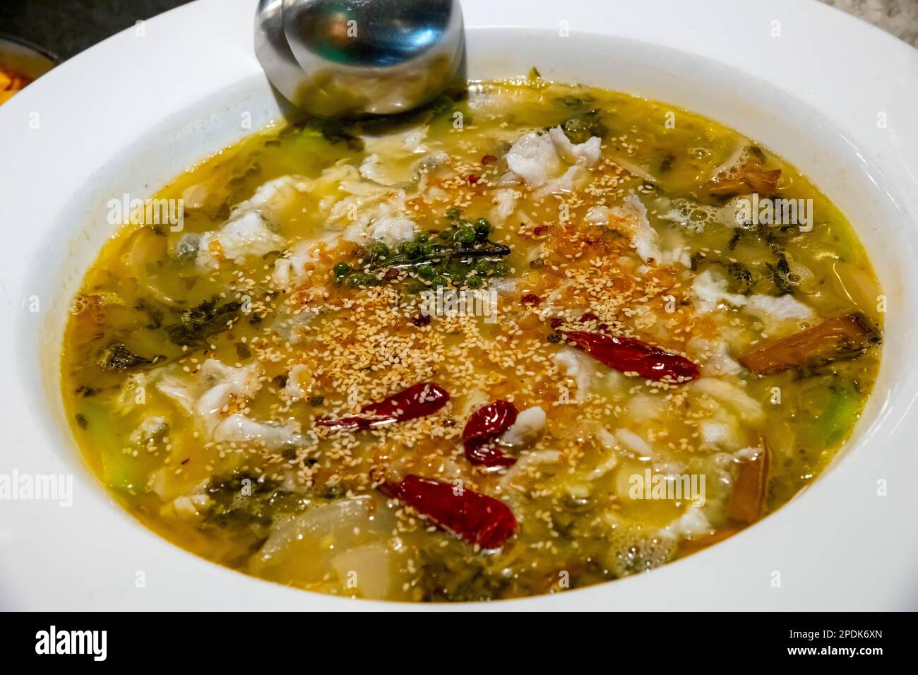 Chinese restaurant, Spicy fish stew, a popular Chinese dish from Sichuan province. Hong Kong , China. Stock Photo
