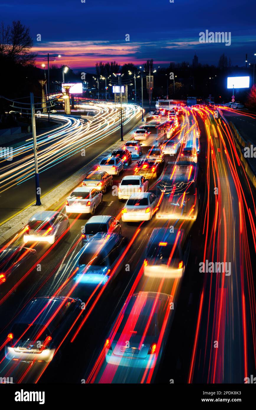 Car traffic light at night city highway Stock Photo Alamy