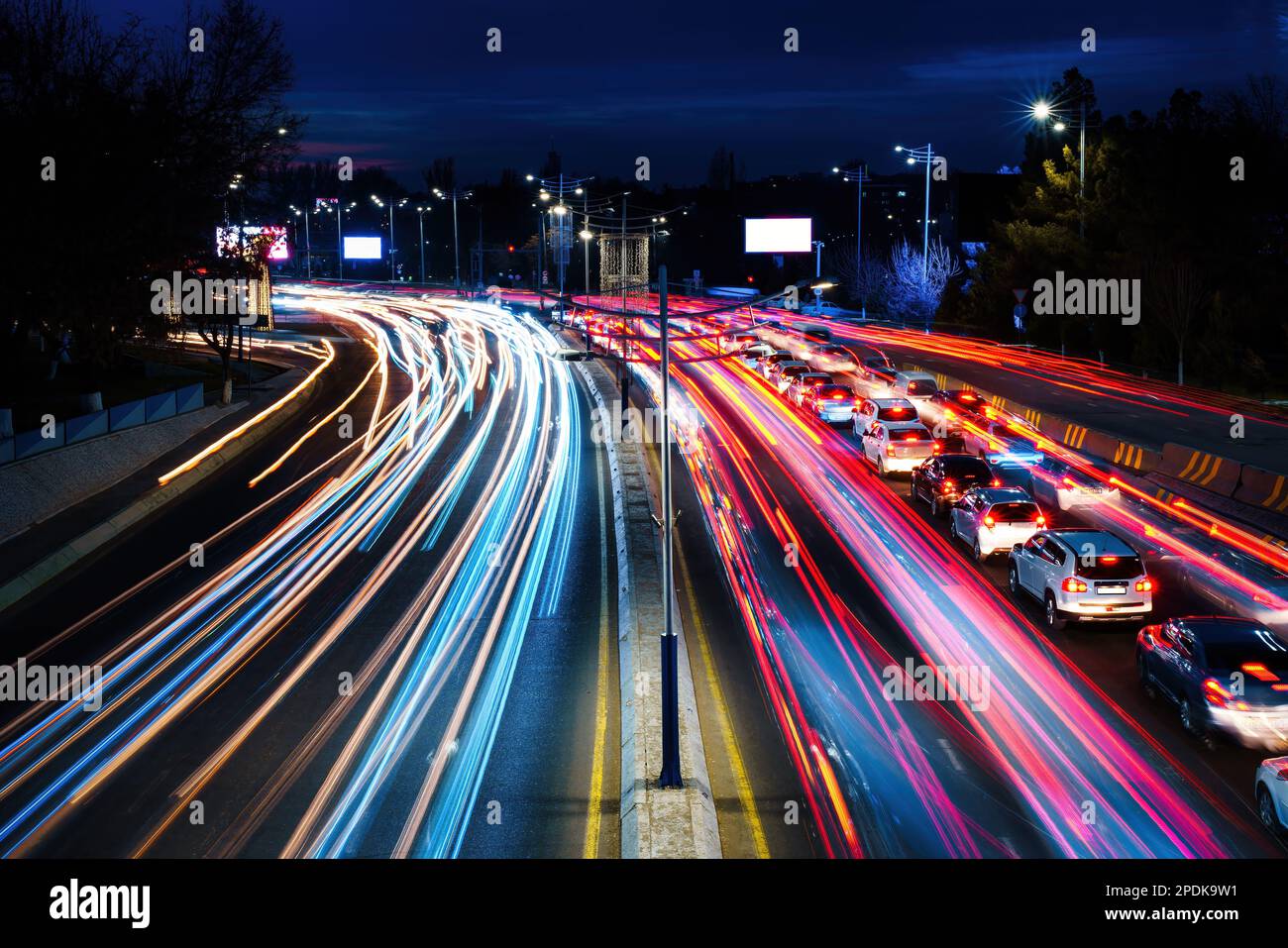 Car traffic light at night city highway Stock Photo Alamy