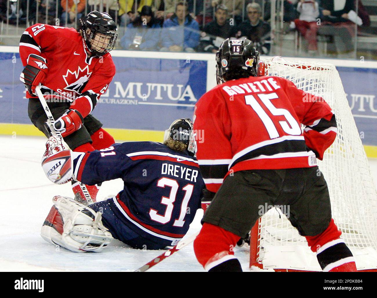 Canada's Correne Bredin, left, scores as her teammate Danielle Goyette, right, looks on, during the 2005 International Ice Hockey Tournament, women preliminary match, between Canada and the United States, at the Turin Palazzo Esposizioni, Italy, Thursday, Nov. 10, 2005. Canada won 5-0. (AP Photo/Antonio Calanni) Stock Photo