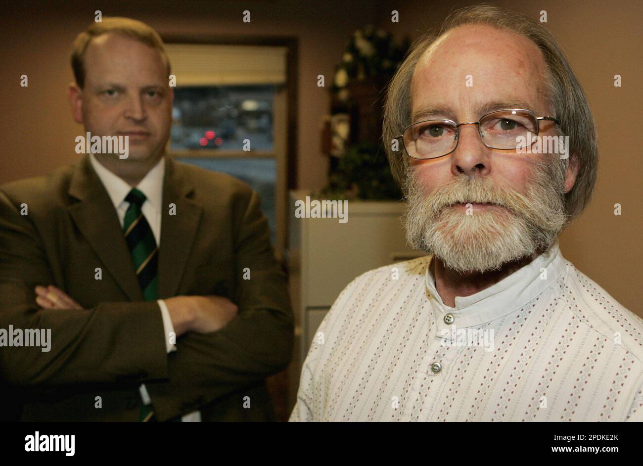 Bob Dougherty, 57, right, who sued Home Depot claiming a prank left him