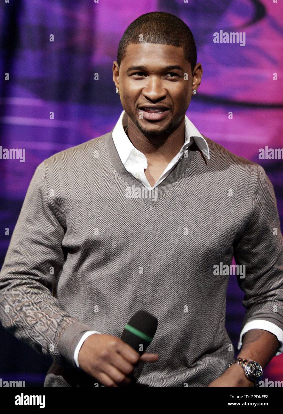 Singer Usher appears on stage during MTV's "Total Request Live" show at