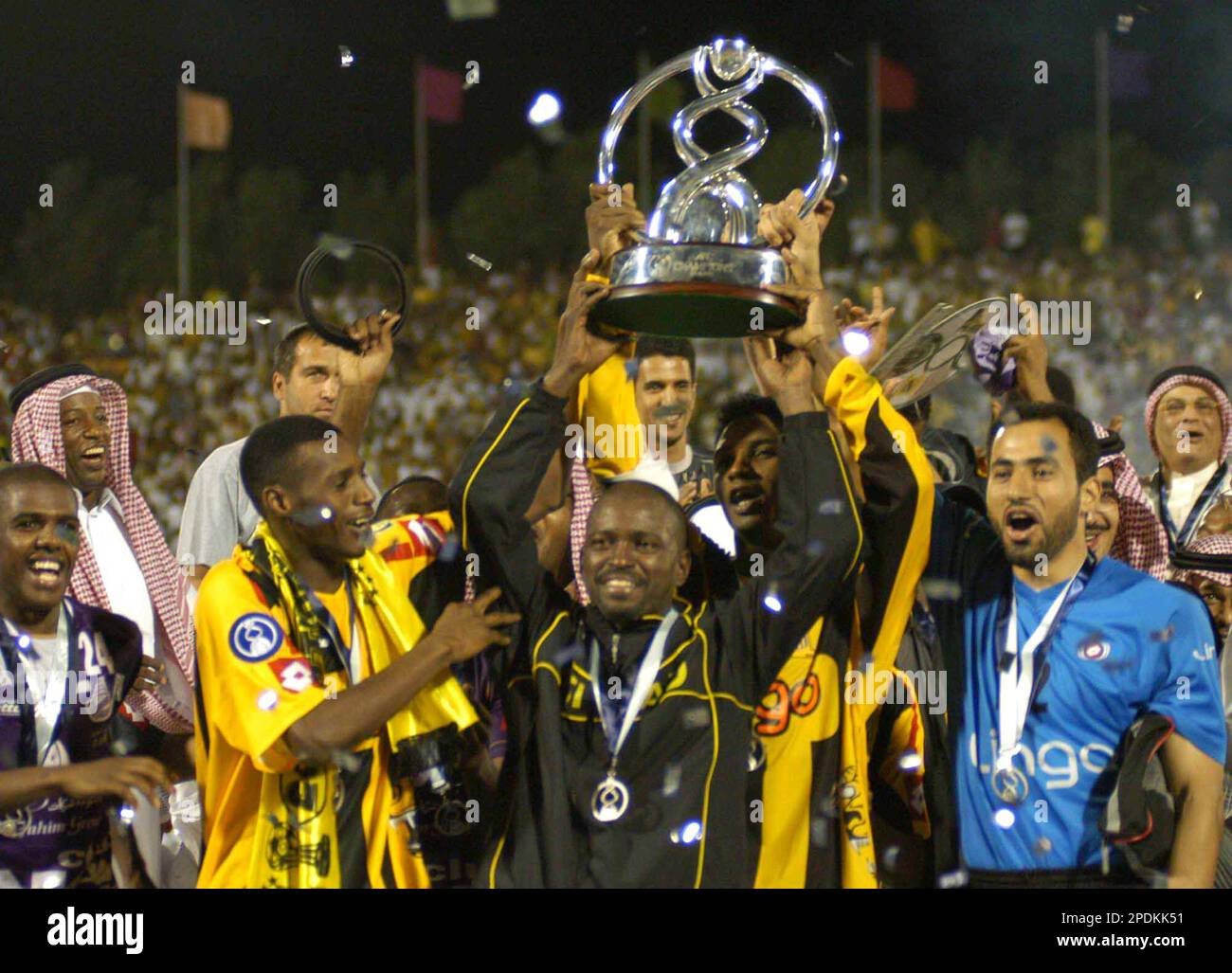 Saudi's Al Ittihad players celebrate trophy after winning the AFC Champions  League final against UAE's Al Ain at Prince Abdullah Al Faisal Stadium in  Jeddah, Saudi Arabia, late Saturday, Nov.5, 2005. Al