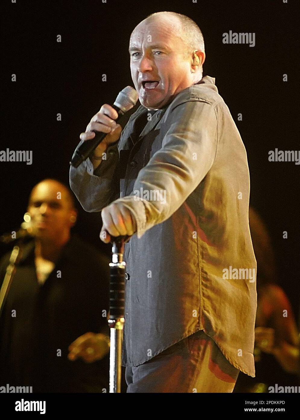 British pop star Phil Collins performs during a concert on his farewell tour in Beirut, Lebanon, Saturday, Nov. 5, 2005. All proceeds of the concert will go to the St. Jude Children's Cancer Center in Beirut. (AP Photo/Hussein Malla) Stock Photo