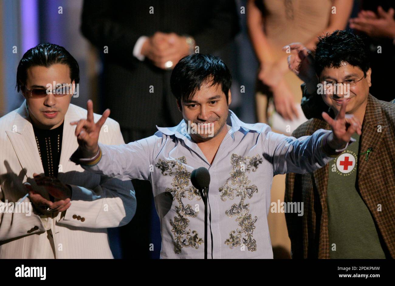 Oscar De La Rosa y La Mafia accept the award for best grupero album for