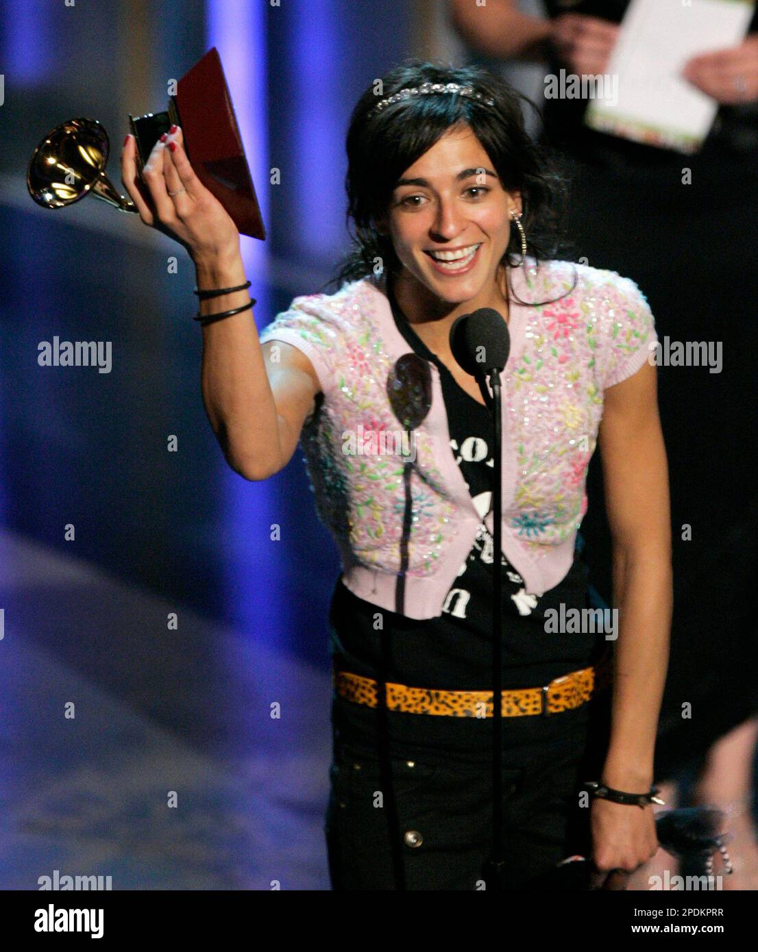 Bebe accepts the award for best new artist at the 6th annual Latin