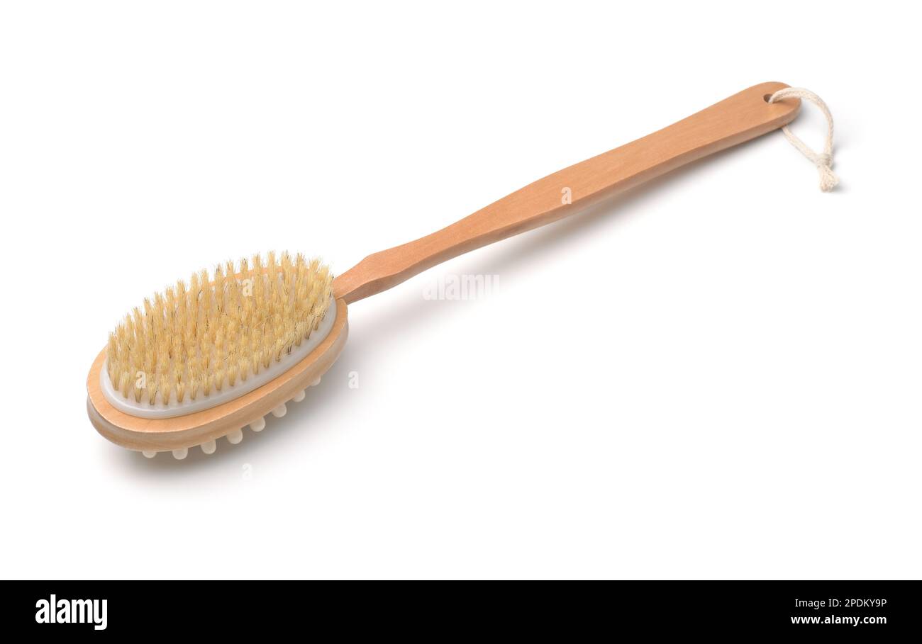 Double-sided body scrub brush with long wooden handle isolated on white Stock Photo
