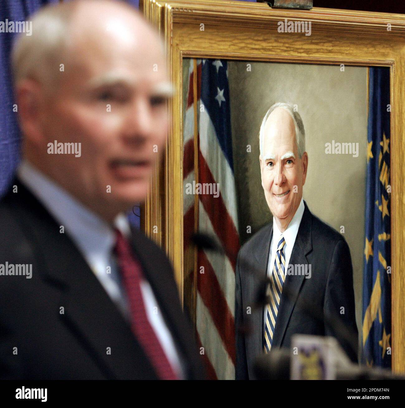 Former Indiana Gov. Joseph Kernan talks after his official portrait was