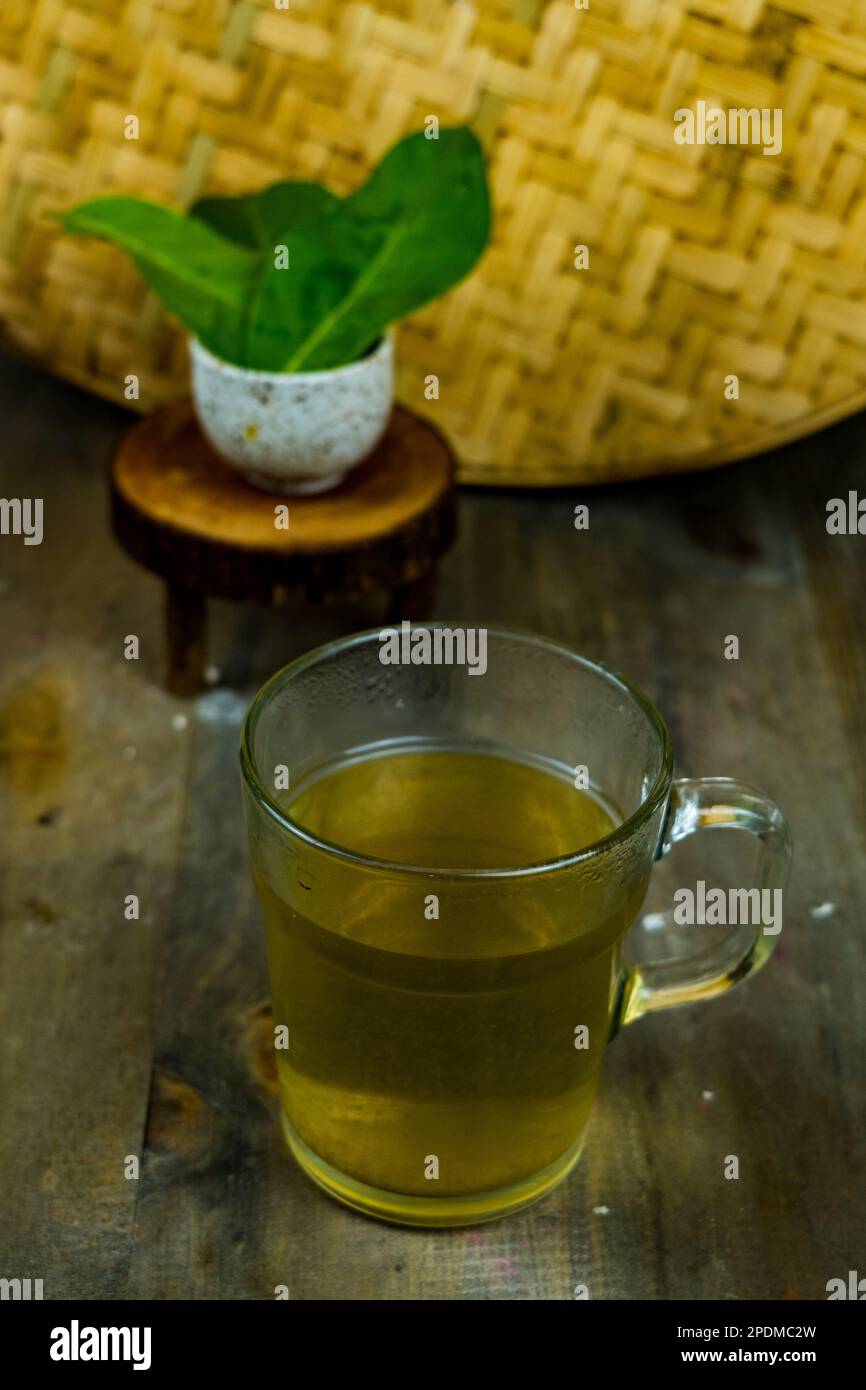 Fresh tea made of bay leaf in a glass on the table Stock Photo - Alamy