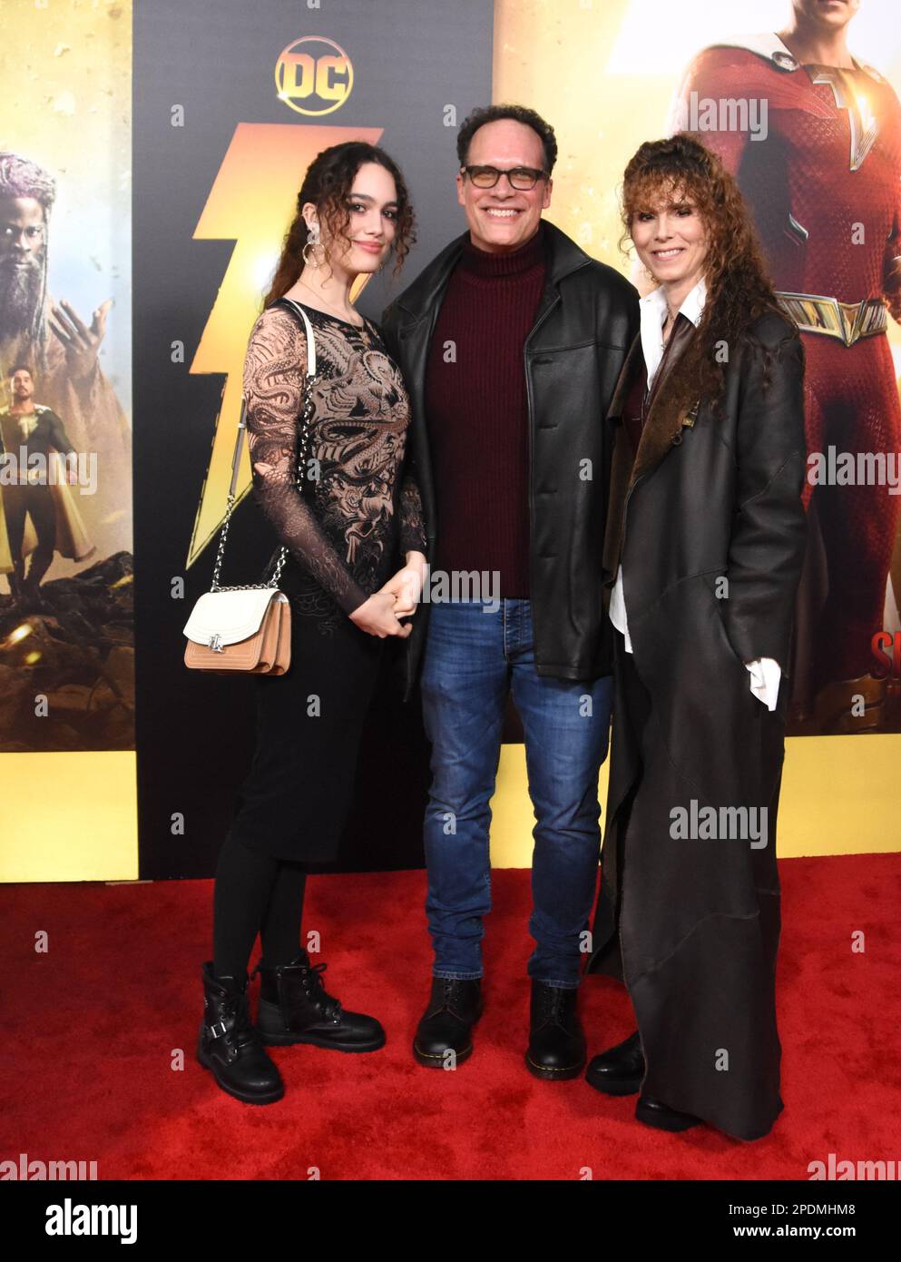 Los Angeles, California, USA 14th March 2023 (L-R) Ondine Caollla Bader, Actor Diedrich Bader and wife Dulcy Rogers attend the Premiere of Warner Bros. 'Shazam! Fury of the Gods' at Regency Village Theatre on March 14, 2023 in Los Angeles, California, USA. Photo by Barry King/Alamy Live News Stock Photo