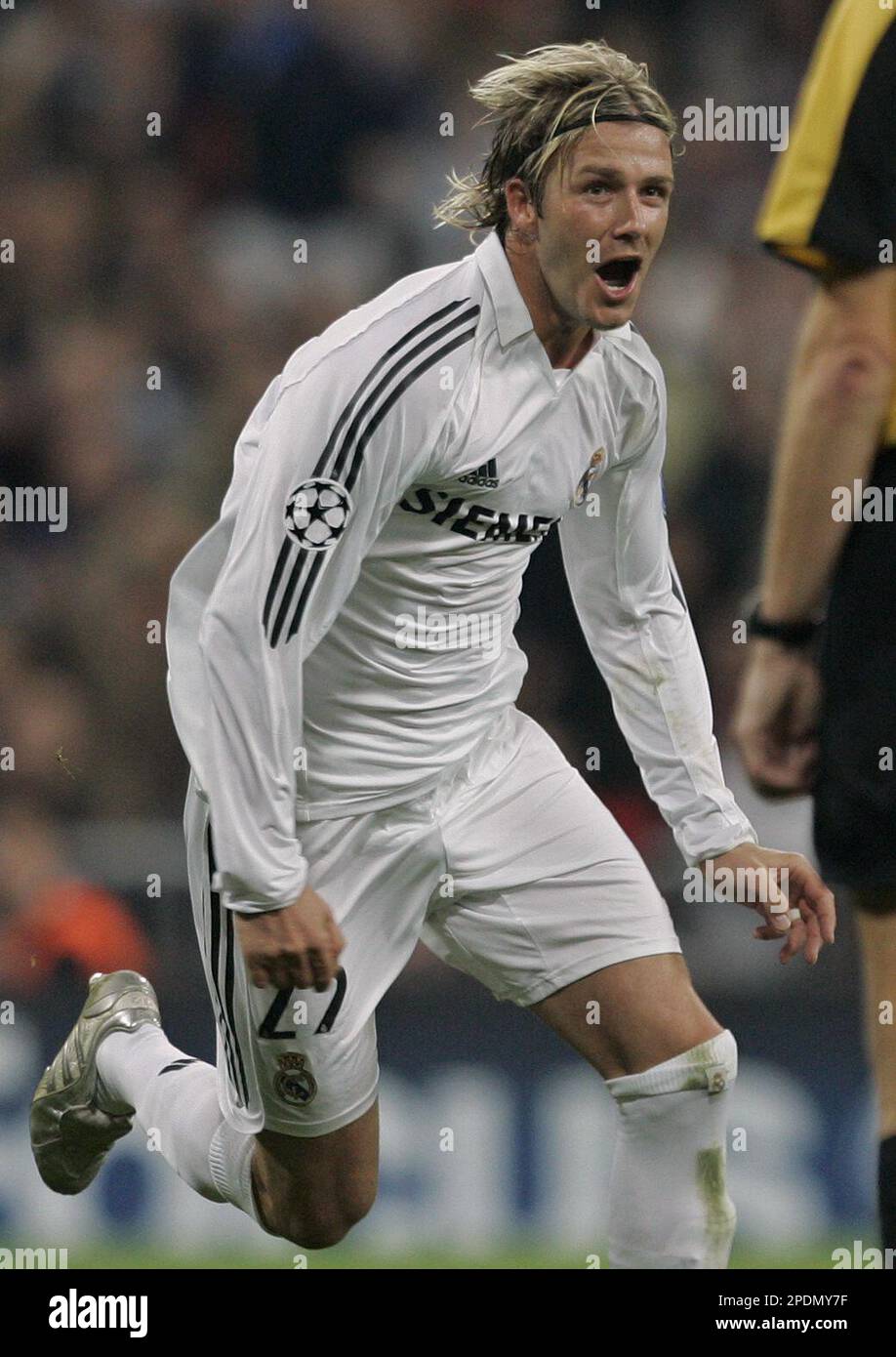 Real Madrid's David Beckham of England celebrates after he scored
