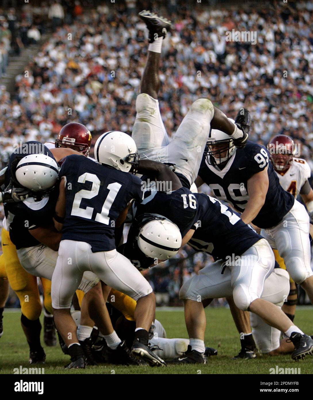 **FILE** Penn State defensive end Tamba Hali (91) is upended during the