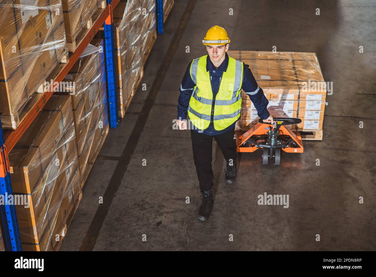 warehouse worker working for inventory store management product logistics shipping industry Stock Photo