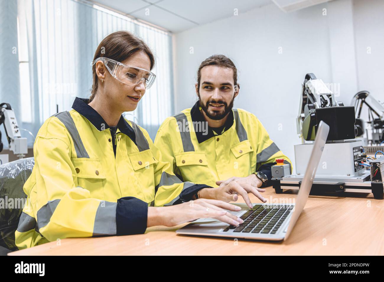 software engineering team working together in robotic technology lap