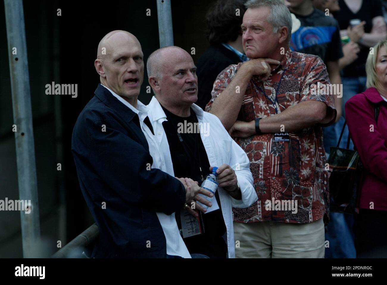 Peter Garrett, left, Australian Labor Party minister and vocalist with politically motivated rock group Midnight Oil, at the Rockin' 4 Rights concert at Sydney Cricket Ground to a 40,000-strong crowd protesting the Liberal (conservative) government’s Industrial Relations policies and changes to workplace laws. A protest march through the streets of Sydney’s city centre preceded the concert. Sydney, Australia. 22.04.07. Stock Photo