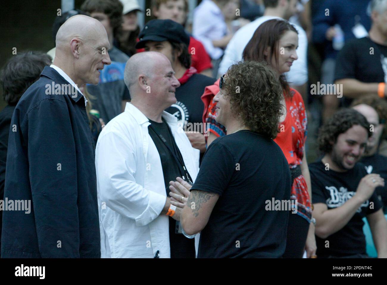 Peter Garrett (left), Australian Labor Party minister and vocalist with politically motivated rock group Midnight Oil, speaking to Dave Gleeson of the Screaming Jets backstage at the Rockin' 4 Rights concert at Sydney Cricket Ground to a 40,000-strong crowd protesting the Liberal (conservative) government’s Industrial Relations policies and changes to workplace laws. A protest march through the streets of Sydney’s city centre preceded the concert. Sydney, Australia. 22.04.07. Stock Photo