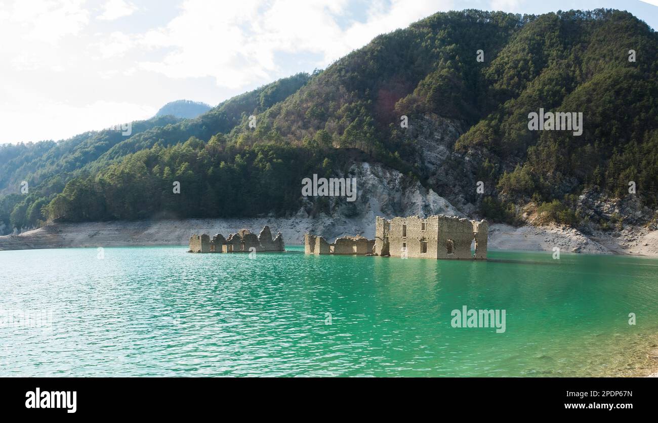 Tramonti di sotto, Italy - View of the artificial Lake of Redona with the emerging remains of old buildings Stock Photo