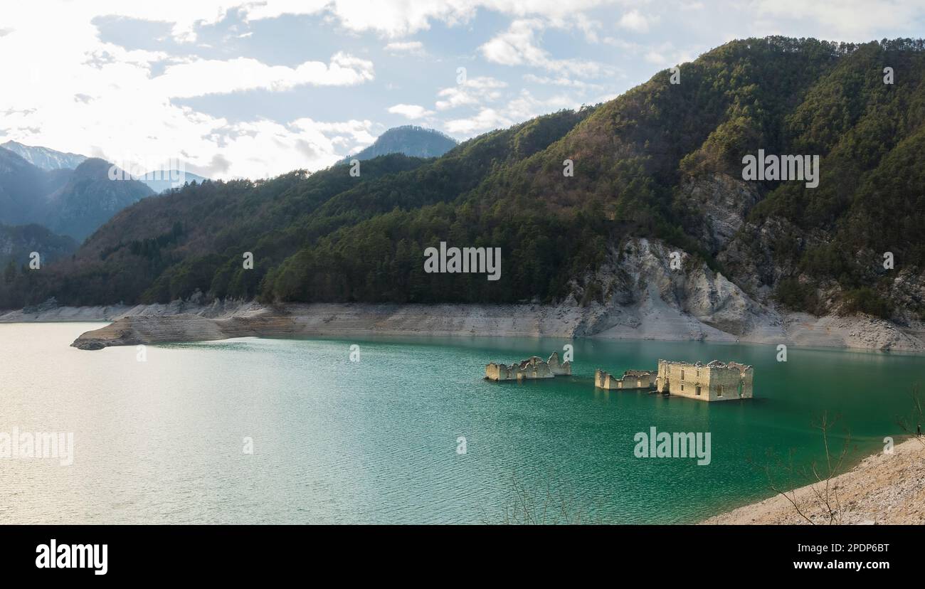 Tramonti di sotto, Italy - View of the artificial Lake of Redona with the emerging remains of old buildings Stock Photo