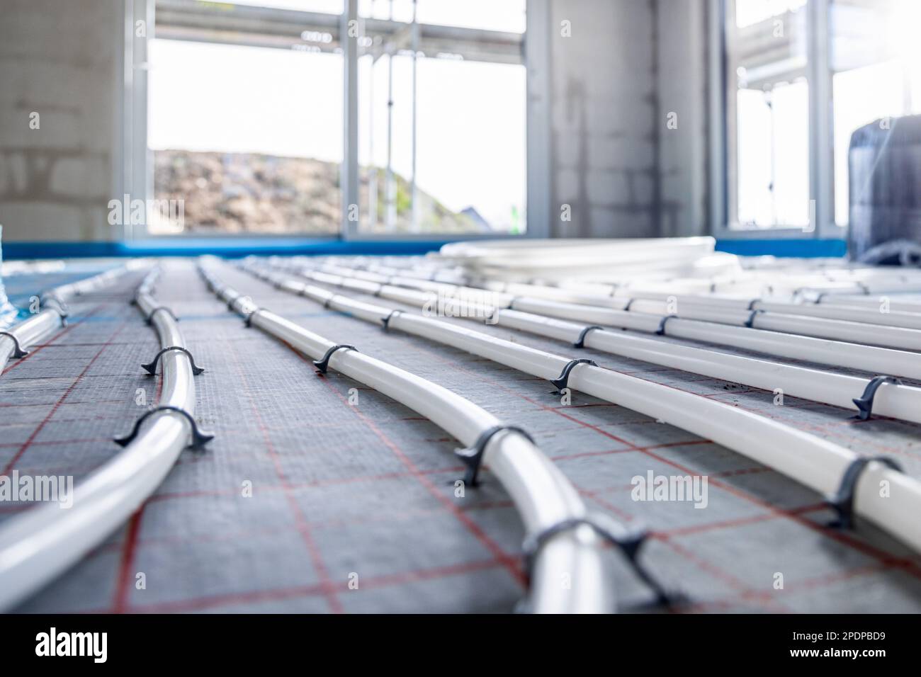Pipes for hydronic underfloor heating Stock Photo Alamy