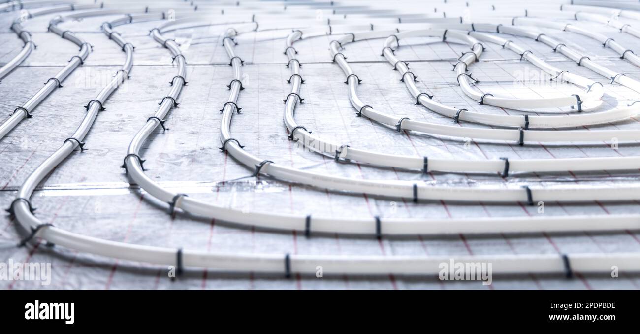 Layout of pipes for hydronic underfloor heating Stock Photo Alamy