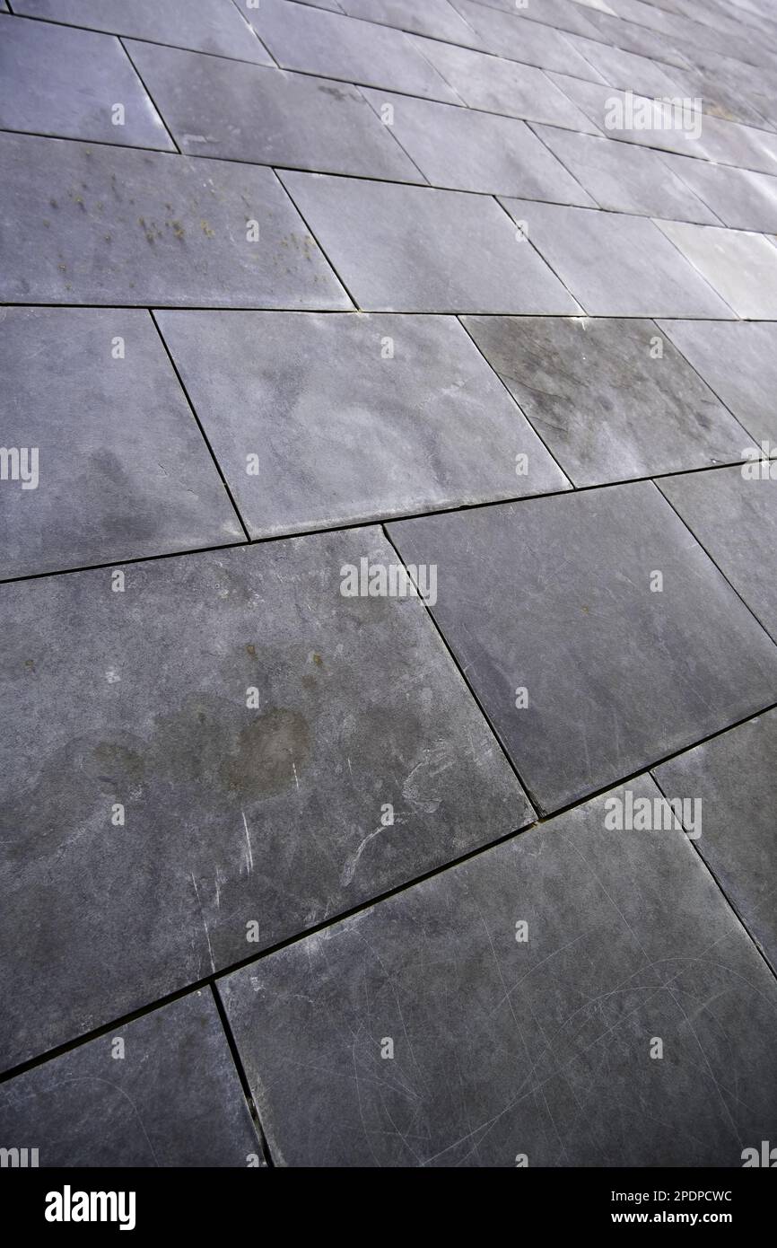 Detail of decorative slate tiles on an exterior wall Stock Photo